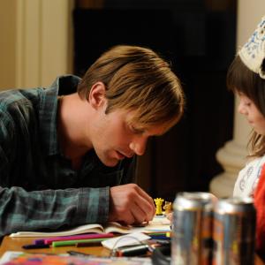 Still of Alexander Skarsgård and Onata Aprile in What Maisie Knew (2012)