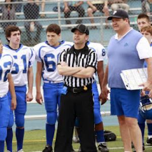 Zach Louis appearing on ABC's Modern Family. (number 60 behind ref)