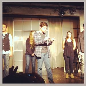 Zach Louis onstage at Second City Hollywood.