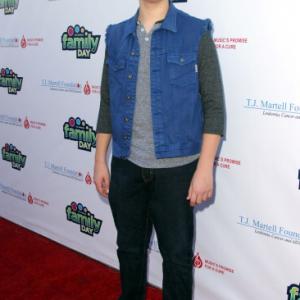 LOS ANGELES CA  NOVEMBER 10 Actor Zach Louis attends The TJ Martell Foundations Family Day LA at CBS Studios on November 10 2013 in Los Angeles California Photo by David BuchanGetty Images for TJ Martell Foundation