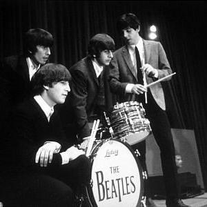 The Beatles George Harrison John Lennon Ringo Starr and Paul McCartney on stage c 1964