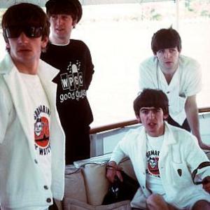 The Beatles Ringo Starr John Lennon George Harrison Paul McCartney on board ship