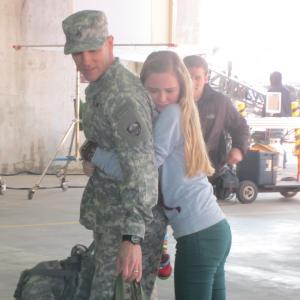 Ella Wahlestedt and Burgess Jenkins on set of Army Wives