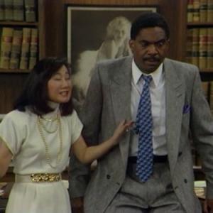 Still of Denice Kumagai and Charles Robinson in Night Court (1984)