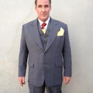 Joseph Wilson as a dead mobster working on the TV show 