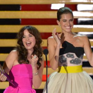 Zooey Deschanel and Allison Williams at event of The 66th Primetime Emmy Awards (2014)