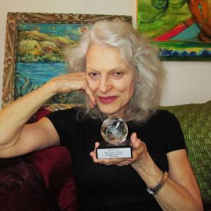 My Day star Judith Roberts with the Best Actress Award from the Queens World Film Festival presented to her at her residence