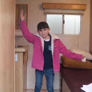 Natalie Miranda showing off her trailer on the set of Last Supper