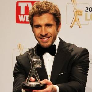 Winning his 4th consecutive Logie in a row