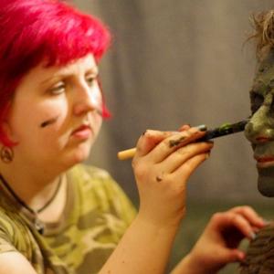 Cassandra Sechler putting make up on Julia Berkowitz for Alligator Bitch