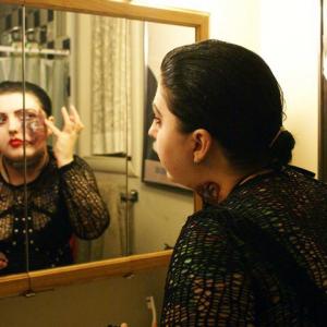 Cassandra Sechler applying makeup on the set of Belle Nouveau 2010