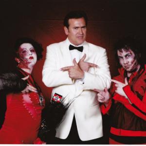 Cassandra Sechler, Bruce Campbell, and Craig Jacobson at the Trinity of Terrors convention. Halloween, Las Vegas. 2009.