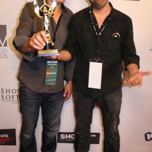 HOLLYSHORTS FILM FESTIVAL 2012 RED CARPET: Dave Schwep and Kelly McCoy with the BEST DOCUMENTARY SHORT AWARD Trophy.