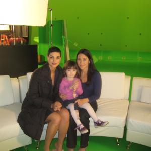 Kennedi Clements on the set of V with Morena Baccarin left and Miranda Frigon right