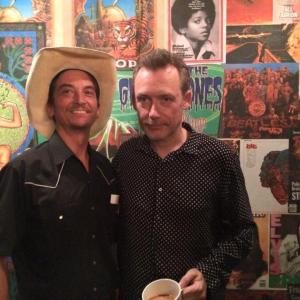 as Buddy Greenbloom, gothic cowboy with Jim Reid, lead singer of the Jesus and Mary Chain.