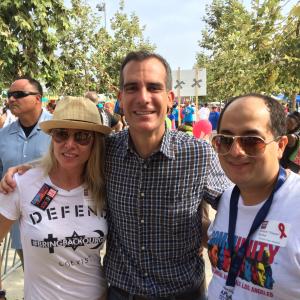 LR Christy Oldham Los Angeles Mayor Eric Garcetti Steven Escobar attends at 30th Annual AIDS Walk LA 2014 in West Hollywood CA