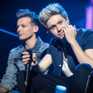 Still of Niall Horan and Louis Tomlinson in One Direction: Tai mes (2013)
