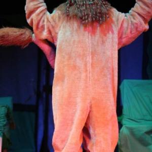 As Cowardly Lion in Wizard of Oz