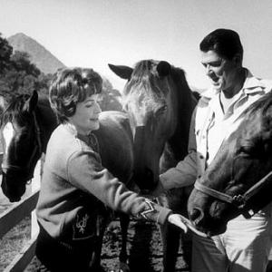 Ronald Reagan and wife Nancy on their ranch, 1966