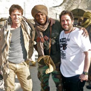 Actors Eric Close Kamal Moummad and director Brett Ratner on set of CHAOS