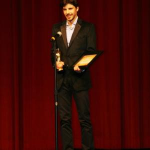 Receiving the Golden Angel Award for Outstanding Newcomer Actor at the Chinese American Film Festival (CAFF) held at the Director's Guild Building in LA (Oct. 2011)