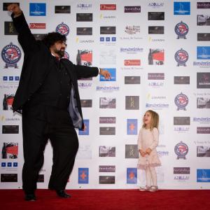 Cinerockom 2013 Hollywood Red Carpet Beverly Hilton Hotel Gabriel Schmidt with daughter Victoria Schmidt for their movie premiere
