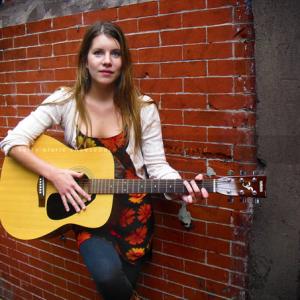 Justine Griffiths with her guitar.
