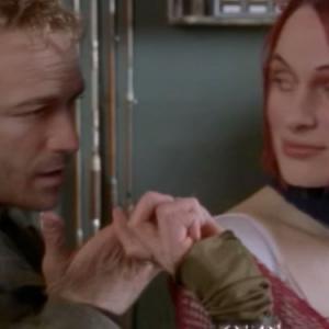 Still of Luke Perry and Dominika Juillet in Jeremiah 2002