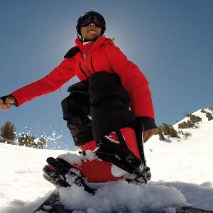 Kevin L. Walker snowboarding down Maoth mountain's advanced black diamond slopes (2014)