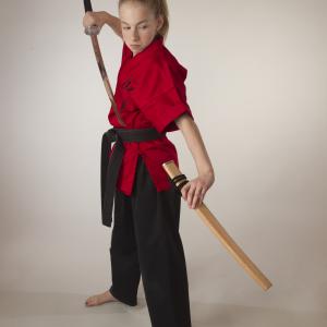 Sammy Smith 13 time World Champion Martial Artist proficient in the use of the sword as well as nunchucks kamas and Bo Staff