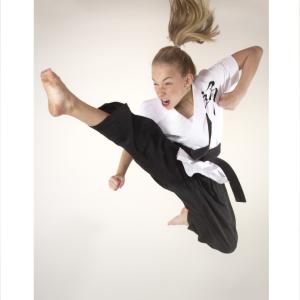Sammy doing a jump front kick extreme martial arts