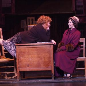 Miss Hannigan (played by Sally Struthers) and Grace Farrell (Christanna Rowader) in the musical Annie