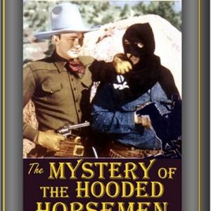 Charles King and Tex Ritter in The Mystery of the Hooded Horsemen 1937