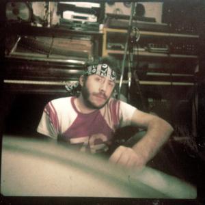 Anthony Cedric Vuagniaux in his analog studio