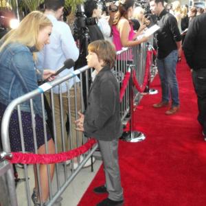 Aidan being interviewed on the red carpet at the LA premiere of ARGO.