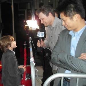 Aidan being interviewed on the red carpet at the LA premiere of ARGO.