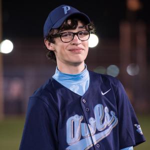Austin York (Joey Bragg) takes the field in The Outfield.