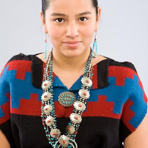 Camille Manybeads in Traditional Dine Navajo Rug Dress