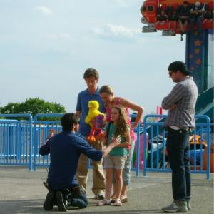 Still image of Jodie Shultz and cocast Joe Mathews and Leila Davis on the set of Sesame Place