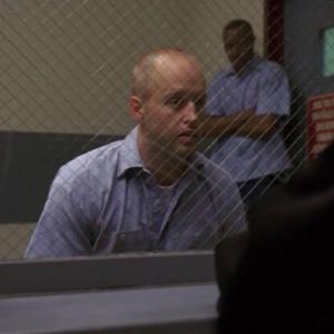 Sergei Malatov (Chris Ashworth) lets Marlo know who is in charge when Marlo comes to visit him in prison during Season 5.