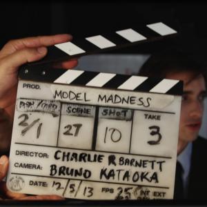 Charlie R Barnett just about to slate Scene 27 With Matt Oxley and Michael Magafas on the model madness set