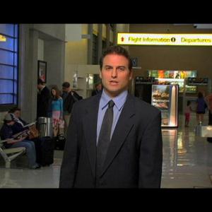 Josh Karch as the Host in the mockumentary US Air Marshals