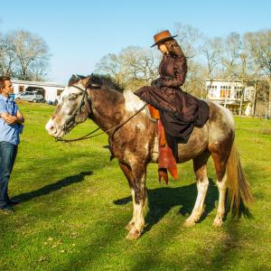 Ciara Flynn being directed on horseback
