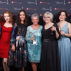 Bomb Girls winner of Outstanding Drama Series at the 2013 Gracie Awards Adrienne Mitchell, Charlotte Hegele, Jodi Balfour, Debra Drennan, Janis Lundman, Meg Tilly & Ali Liebert