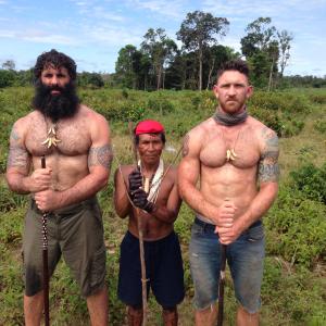 Devan Long and his brother Rien with the lead hunter of the Tatooya tribe while filming Going Native in the Amazon