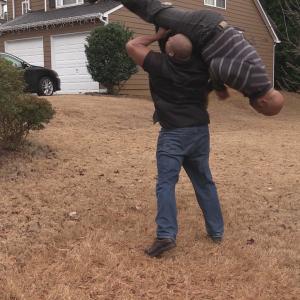 Walter Hendrix III & Lynn Christopher performing a stunt on the set of 