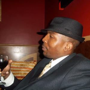 Terence V Steele hosts Lovers Lounge at Churchill Grounds in downtown Atlanta! May 2011 edition Hes sipping on something    we were told its Grape Juice