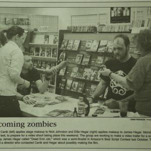 Newspaper photo of preproduction for Dead End Job Pitch Film