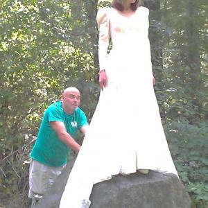 Upon a rock she stood in ballet slippers and wedding gownmust be making a movie 