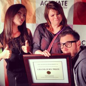 After winning the Grand Jury Prize for their film Not Funny at the Sherry Theater 120 Hour Film Festival From left to right Virginia Crawford Writer Actress Kim Beavers Writer Director Actress Editor and Alex Grossfeld Cinematograp